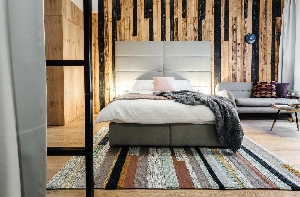 מיטה או מיטות בחדר ב-Ski&Sun Apartamenty