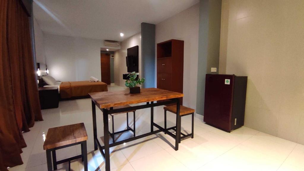 Postel nebo postele na pokoji v ubytování Gempita House Bali