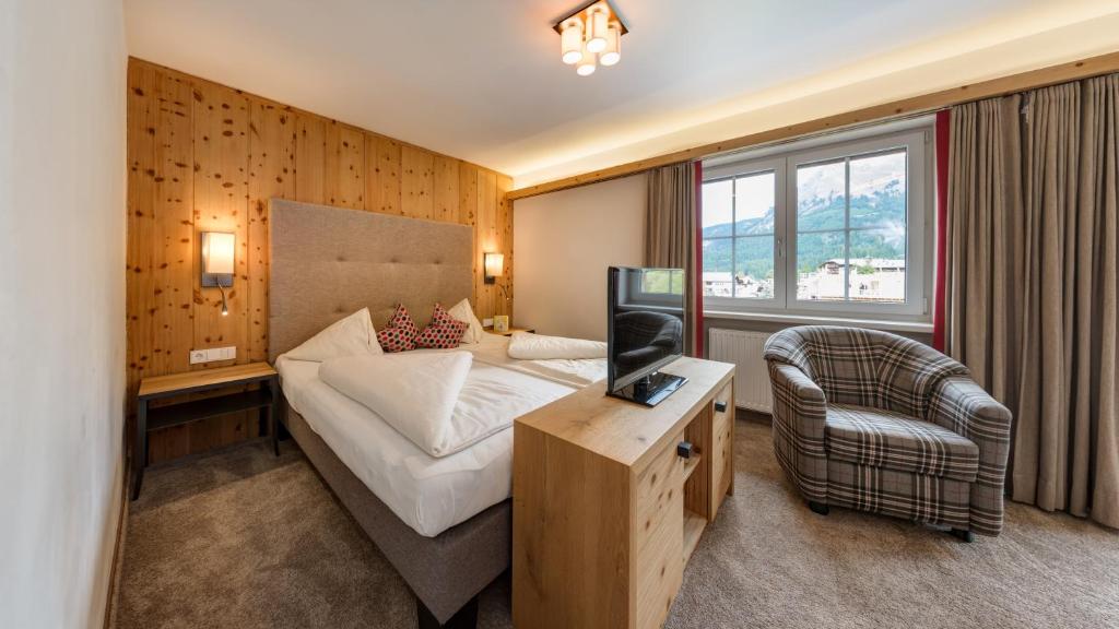 Postel nebo postele na pokoji v ubytování Almhotel Told
