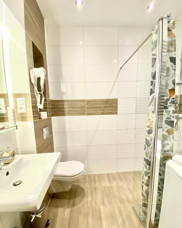 Kúpeľňa v ubytovaní Apartament KonDor Shekspir