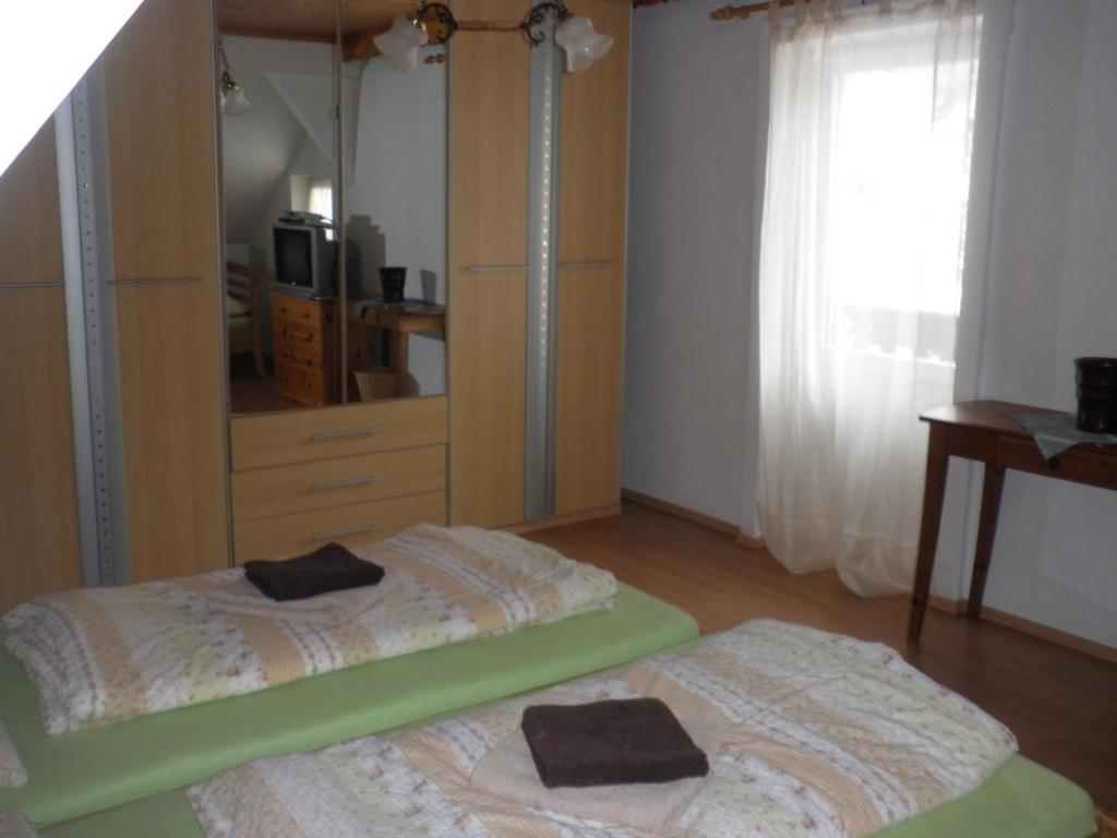 Letto o letti in una camera di Alpenpension