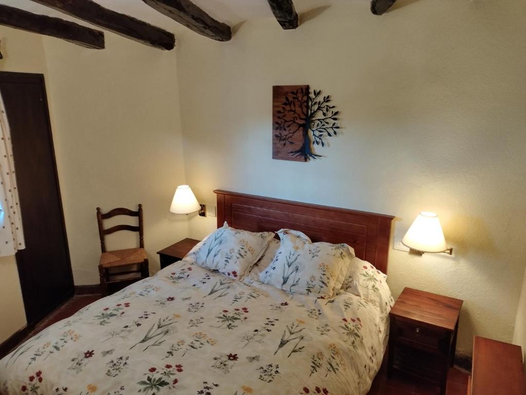 Postel nebo postele na pokoji v ubytování Casa Martí, alojamiento rural con encanto