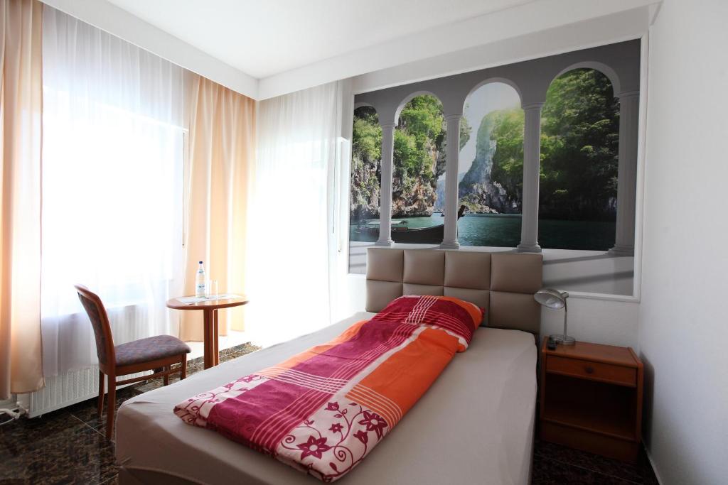 Postel nebo postele na pokoji v ubytování Hotel Sofia