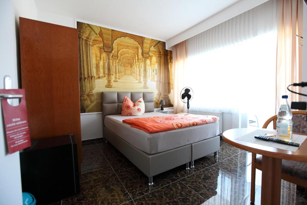 Postel nebo postele na pokoji v ubytování Hotel Sofia