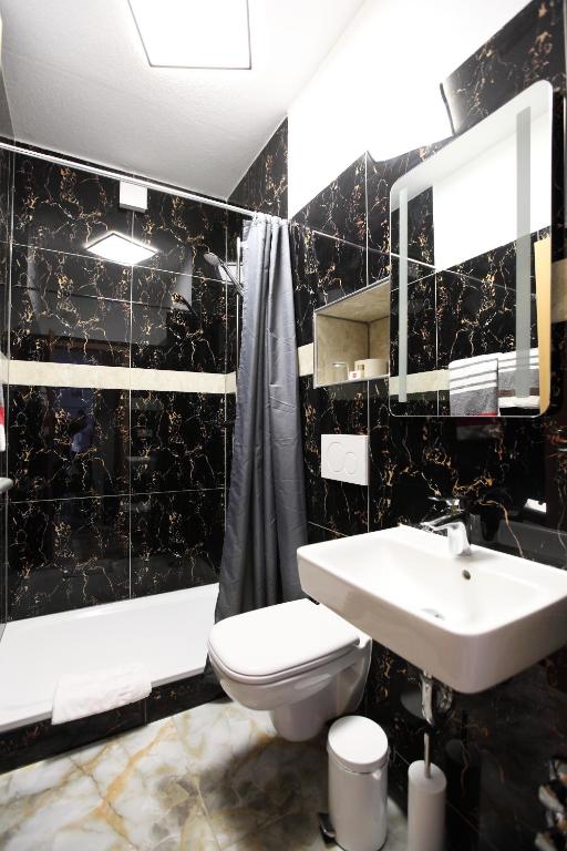 Koupelna v ubytování Hotel Sofia