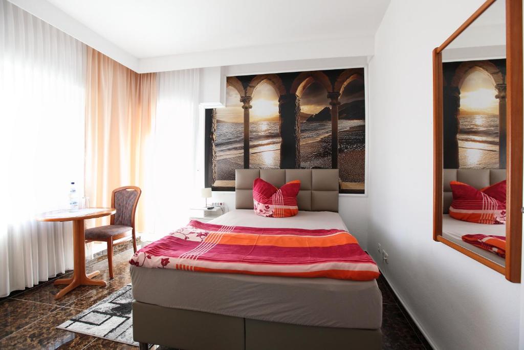 Postel nebo postele na pokoji v ubytování Hotel Sofia