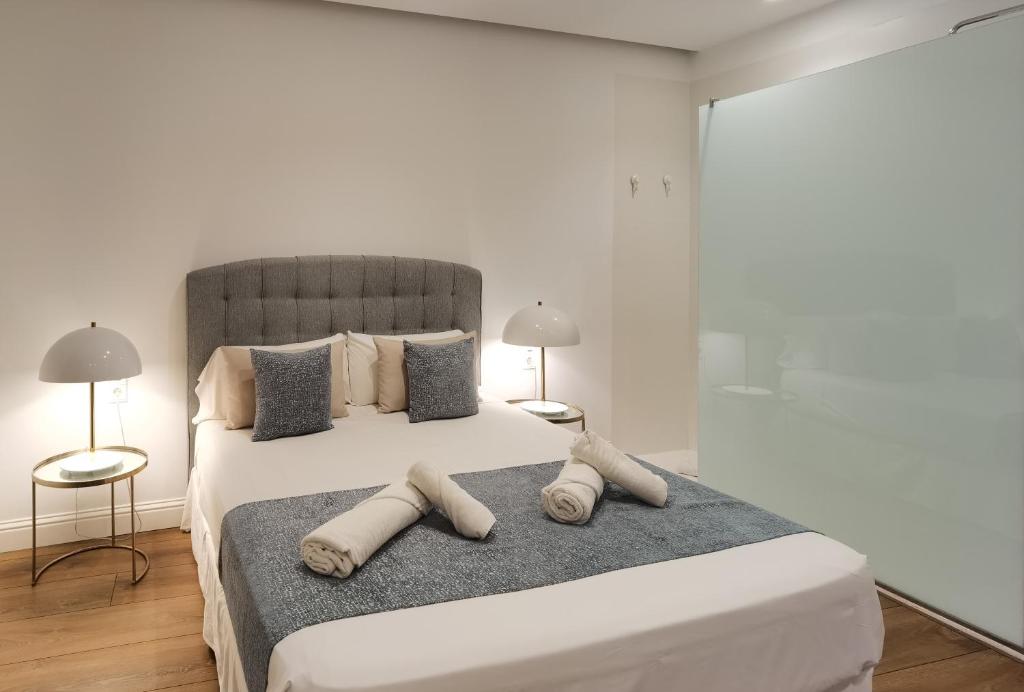 Postel nebo postele na pokoji v ubytování Torres de Serranos Apartments - TTdSSa VLC