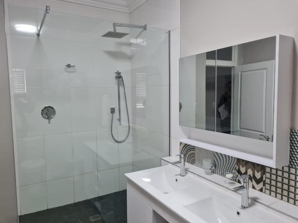 Et badeværelse på Point Village Accommodation - Beach Club 307