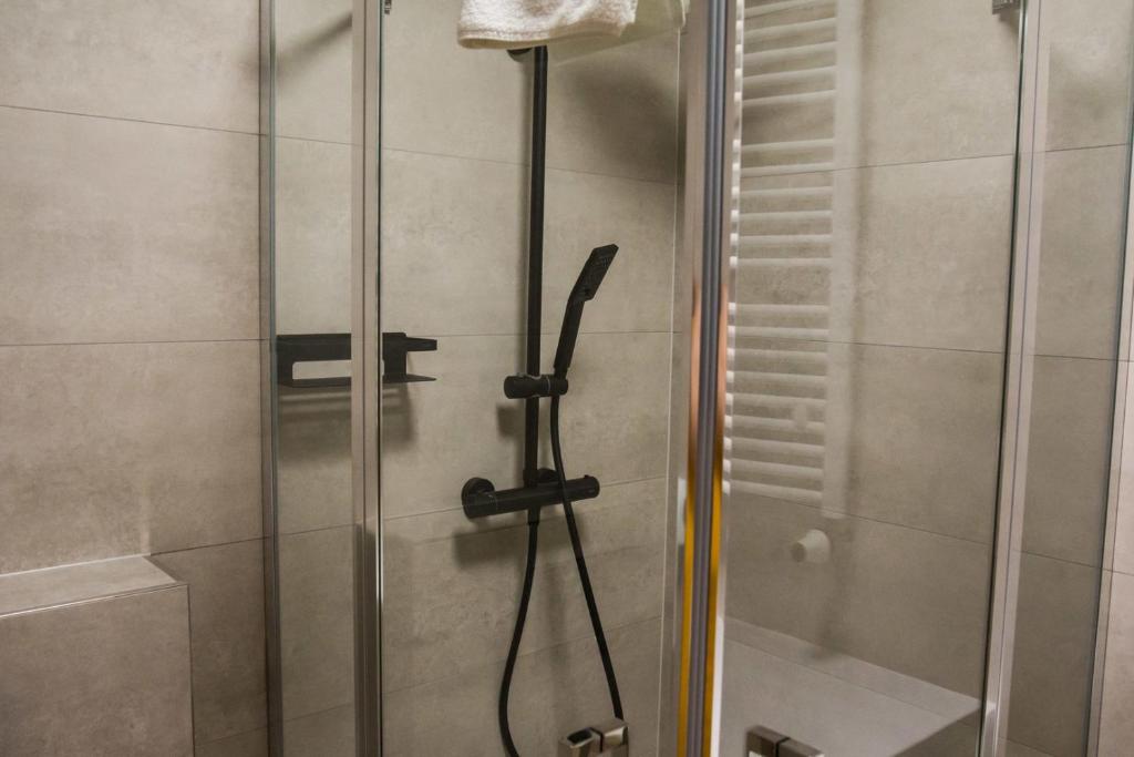 Koupelna v ubytování Miodowa Faktoria 5a by Rentoom