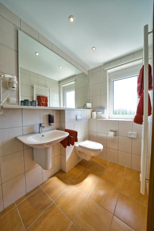 Koupelna v ubytování Hotel Tenner