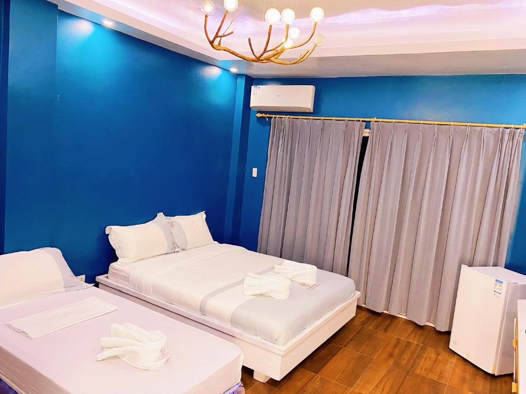 Postel nebo postele na pokoji v ubytování 71% Diving Resort