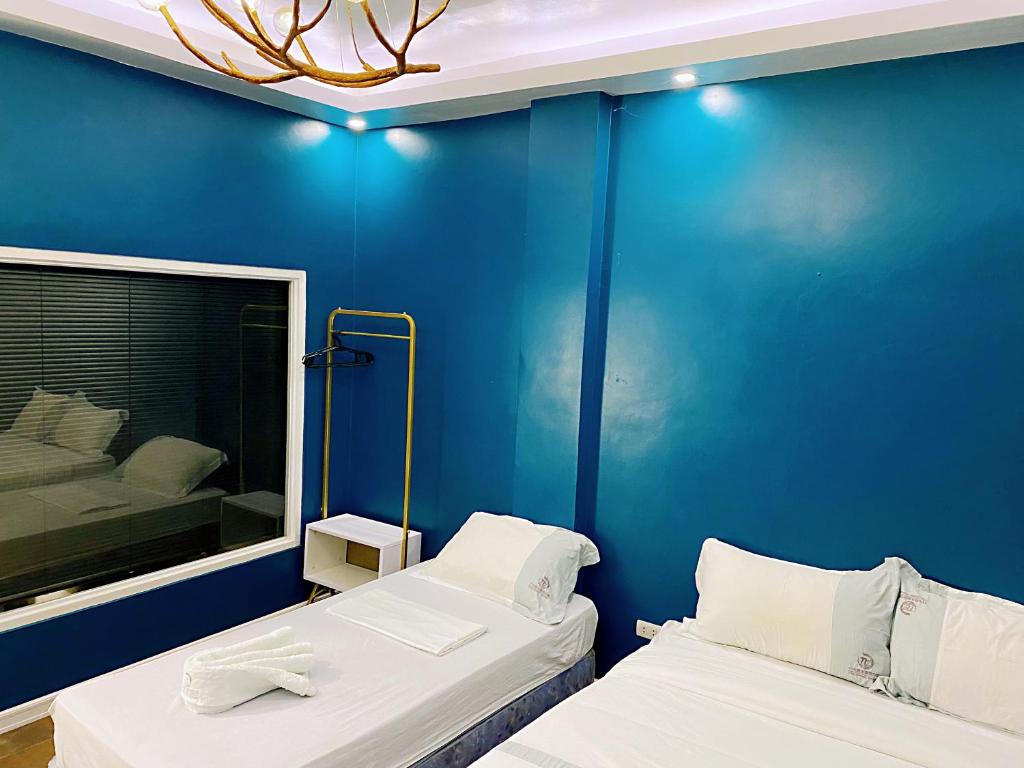 Postel nebo postele na pokoji v ubytování 71% Diving Resort