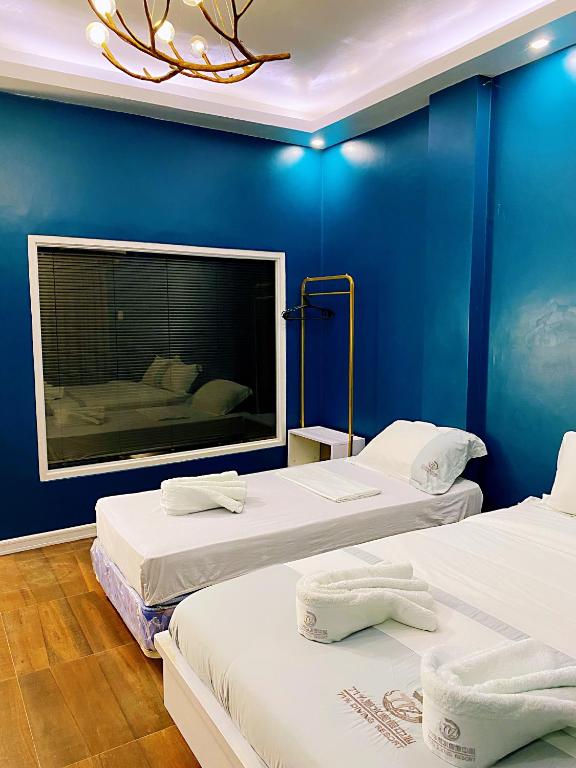 Postel nebo postele na pokoji v ubytování 71% Diving Resort