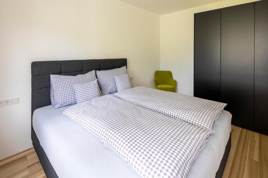 Postel nebo postele na pokoji v ubytování am Greben Apartments eins - zwei - sechs - sieben
