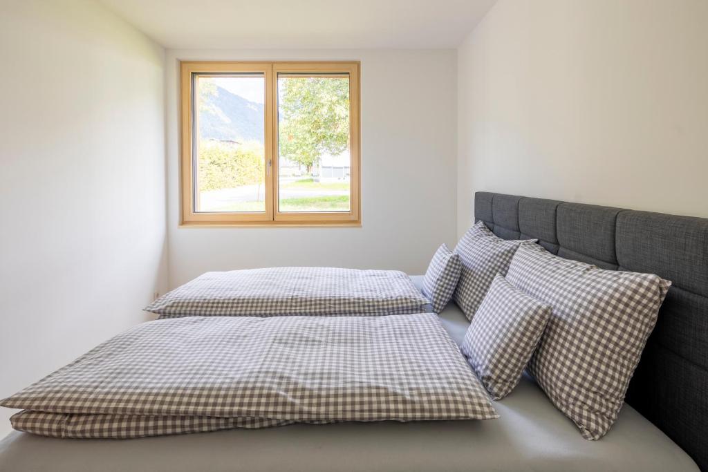 Postel nebo postele na pokoji v ubytování am Greben Apartments eins - zwei - sechs - sieben