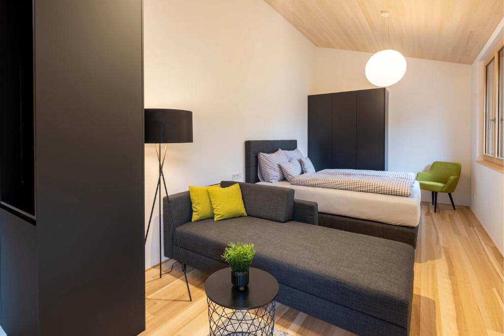 Postel nebo postele na pokoji v ubytování am Greben Apartments eins - zwei - sechs - sieben
