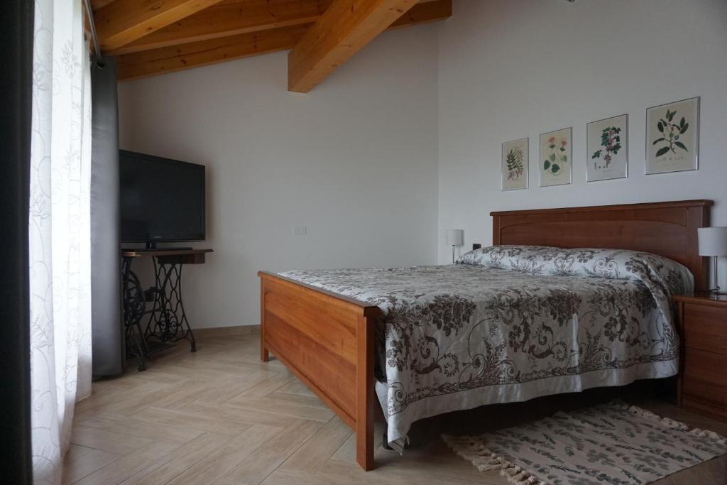 Postel nebo postele na pokoji v ubytování Al Picchio Verde A.P.S.