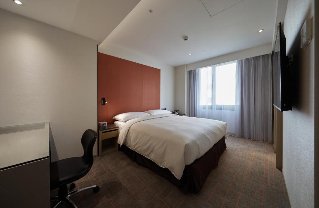 TV a/nebo společenská místnost v ubytování K Hotels Taipei Linsen