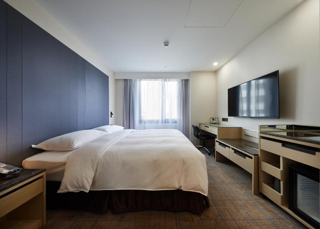 TV a/nebo společenská místnost v ubytování K Hotels Taipei Linsen