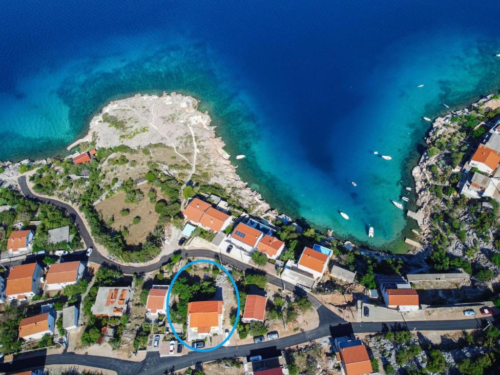 an aerial view of a resort next to the ocean at Apartment Daniel - KBG404 by Interhome in Pandžinac