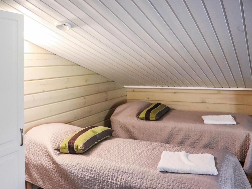 Postel nebo postele na pokoji v ubytování Holiday Home Uulanlinna b- paritalo by Interhome