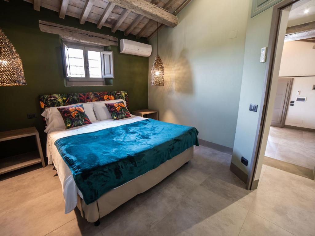 A bed or beds in a room at Chalet Il Talamo by Interhome