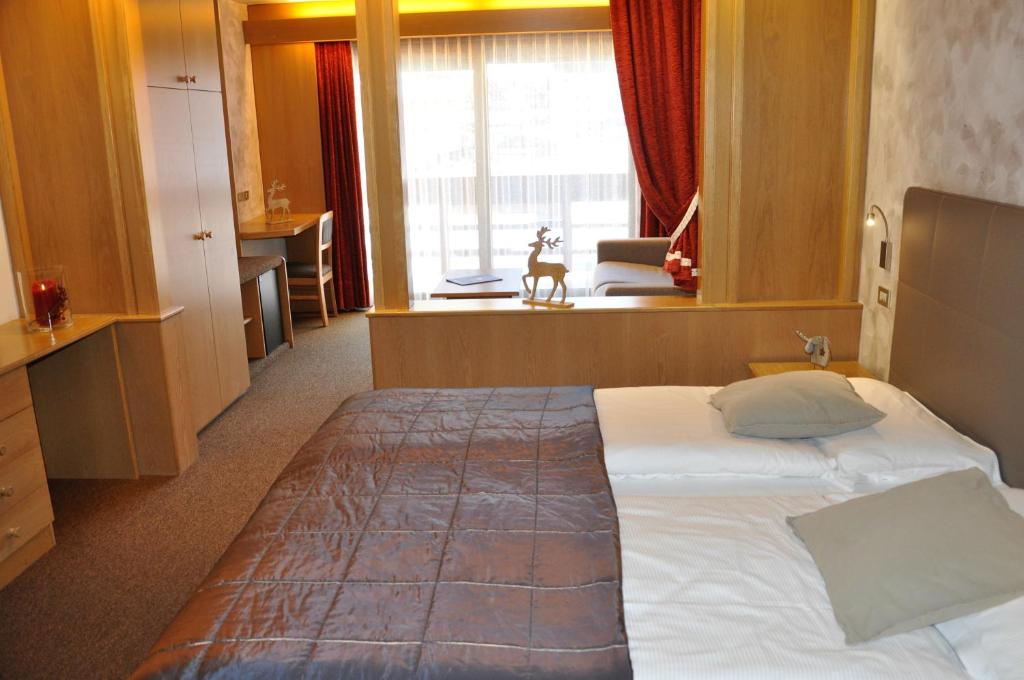 Letto o letti in una camera di Residence Anda
