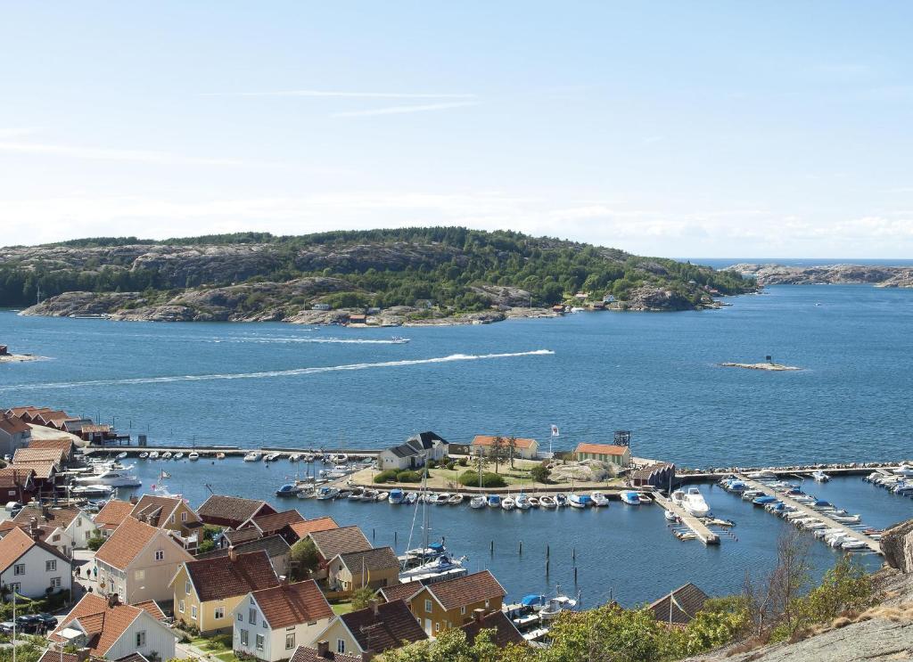 a view of a harbor with boats in the water at Badholmens Vandrarhem in Fjällbacka