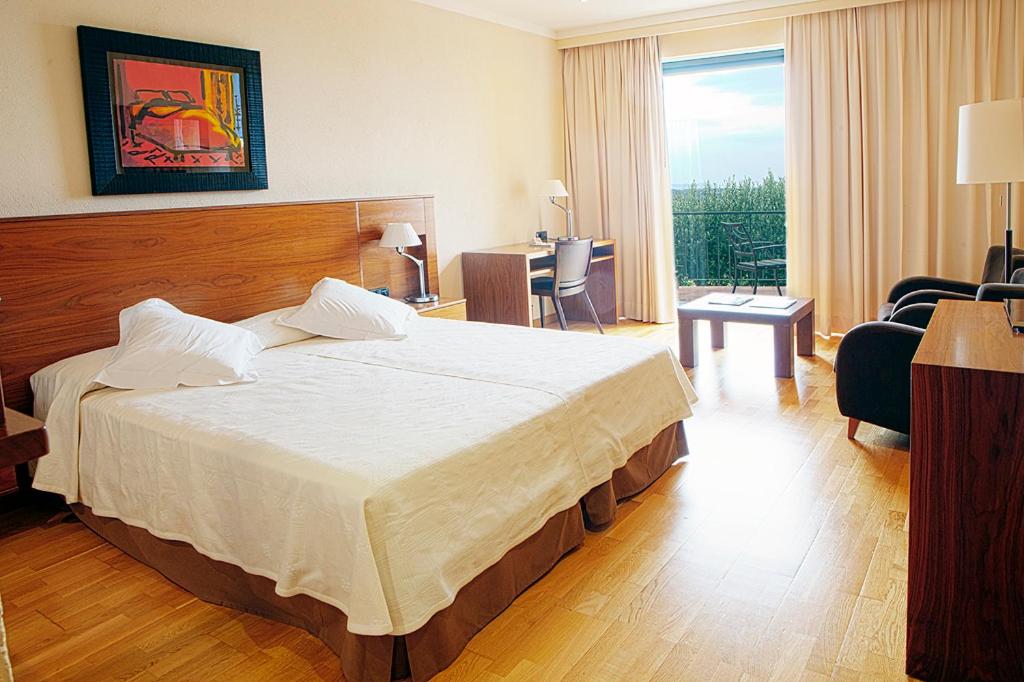 Postel nebo postele na pokoji v ubytování Hotel Can Xiquet