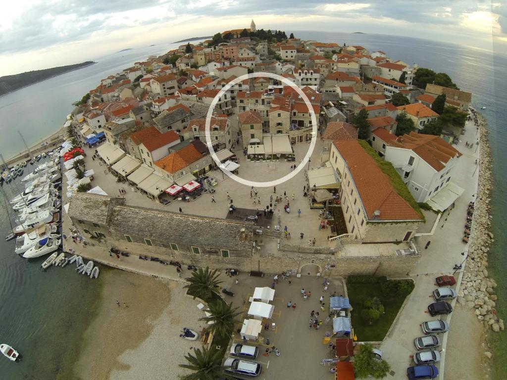 an aerial view of a town on an island at Pansion Kamenar in Primošten