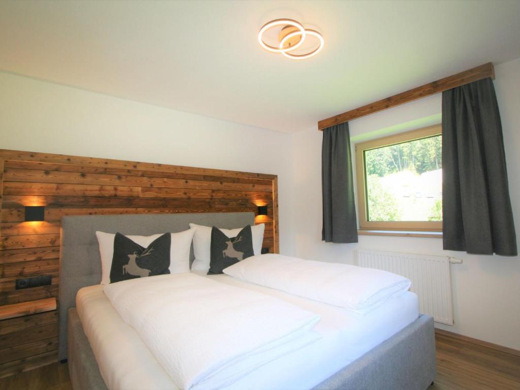 Posteľ alebo postele v izbe v ubytovaní Apartment Geislerhof by Interhome
