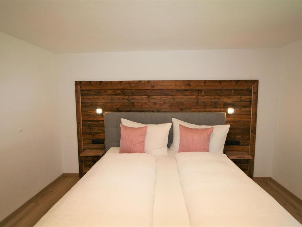 Posteľ alebo postele v izbe v ubytovaní Apartment Geislerhof by Interhome