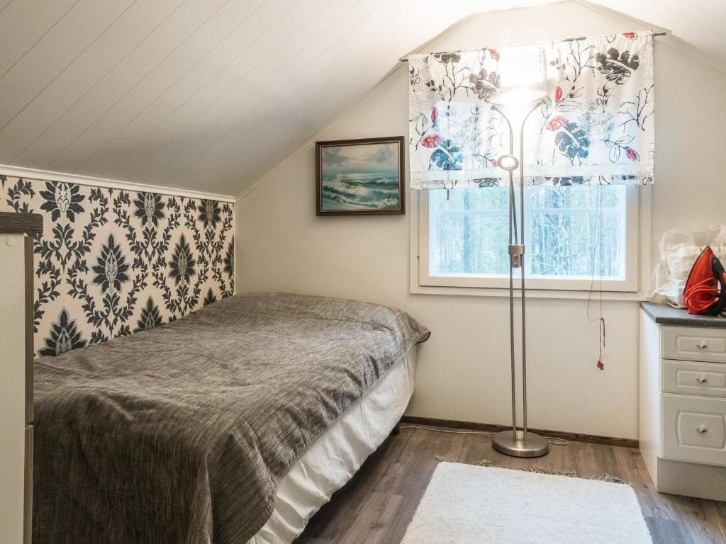 Postel nebo postele na pokoji v ubytování Holiday Home Mirkunranta by Interhome