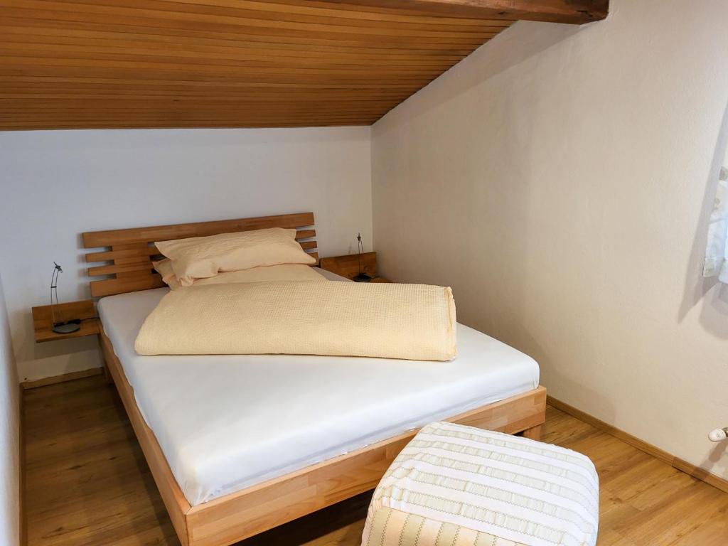 Posteľ alebo postele v izbe v ubytovaní Apartment Frieda by Interhome