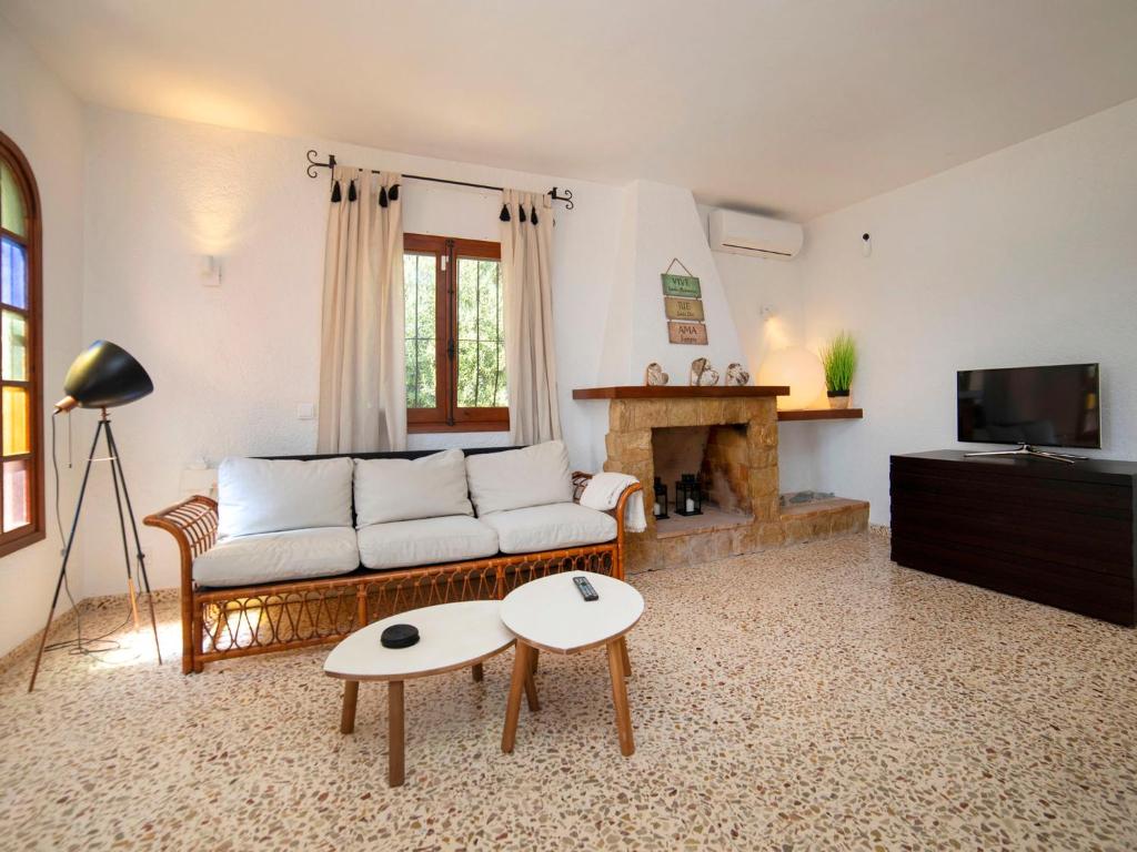 TV a/nebo společenská místnost v ubytování Holiday Home La Marina by Interhome