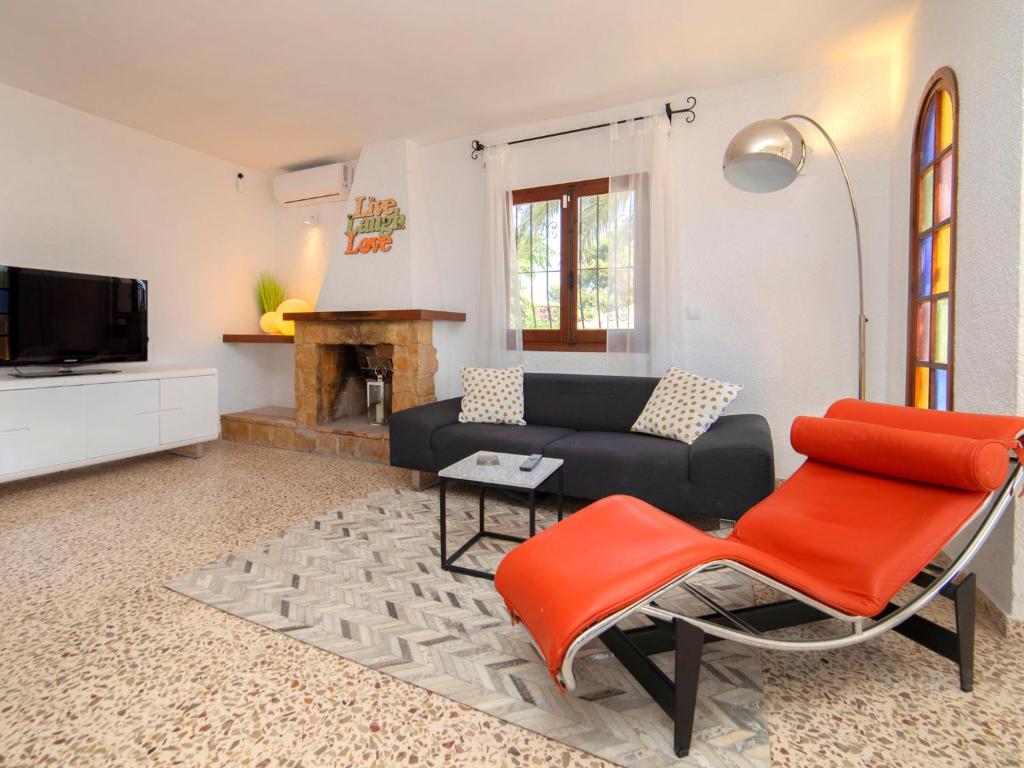 TV a/nebo společenská místnost v ubytování Holiday Home La Marina by Interhome