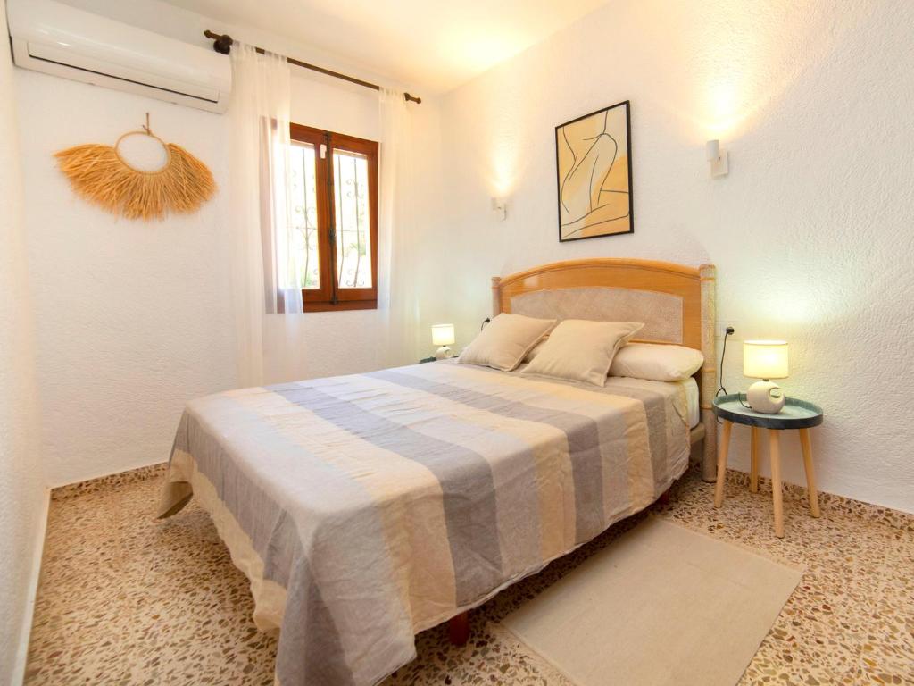 Postel nebo postele na pokoji v ubytování Holiday Home La Marina by Interhome