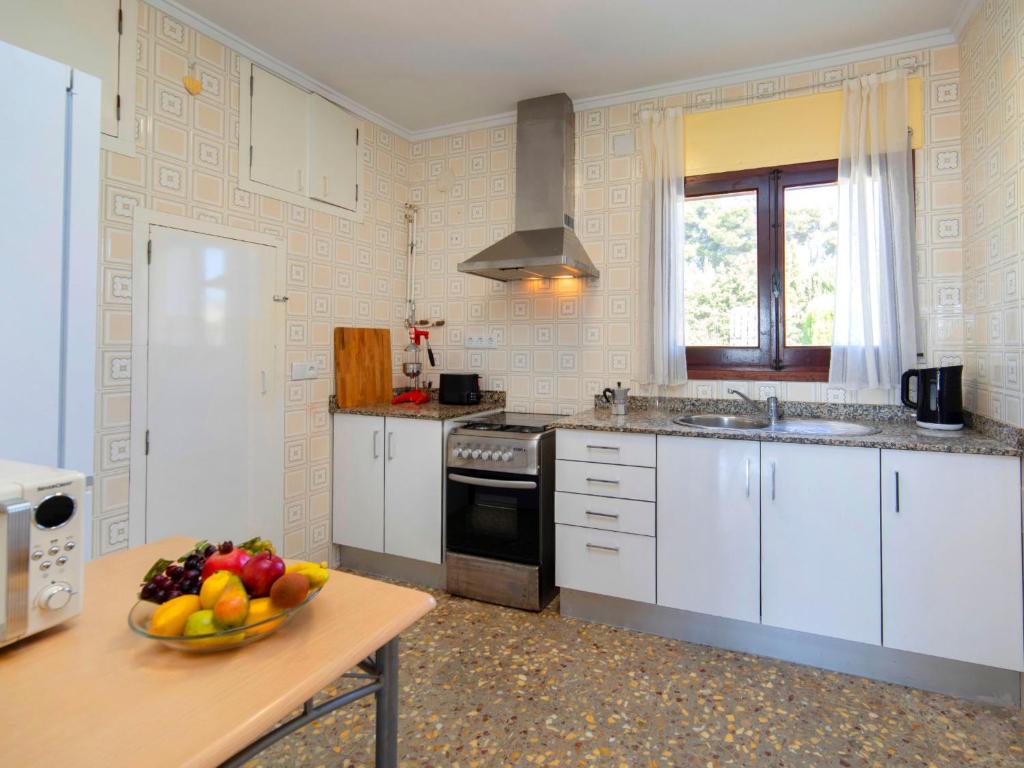 Kuchyň nebo kuchyňský kout v ubytování Holiday Home La Marina by Interhome
