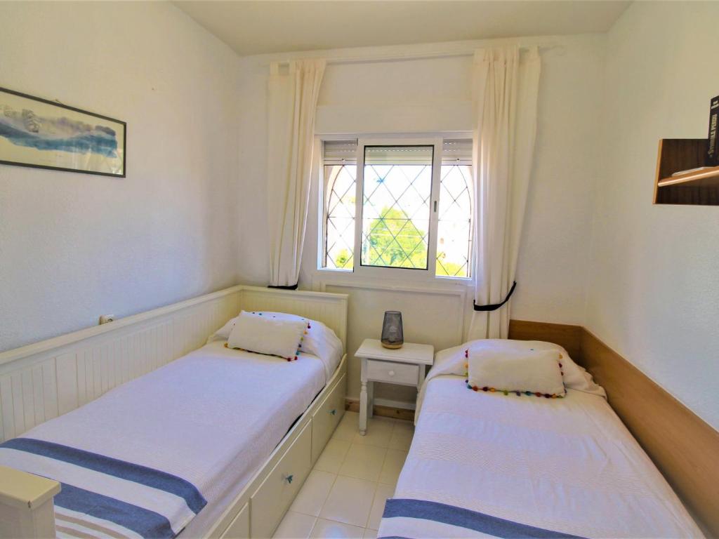 Posteľ alebo postele v izbe v ubytovaní Holiday Home Alkabir playa by Interhome