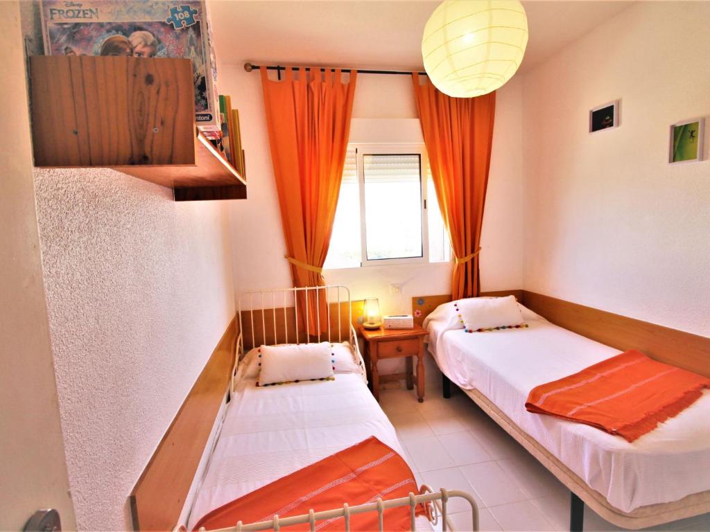 Posteľ alebo postele v izbe v ubytovaní Holiday Home Alkabir playa by Interhome