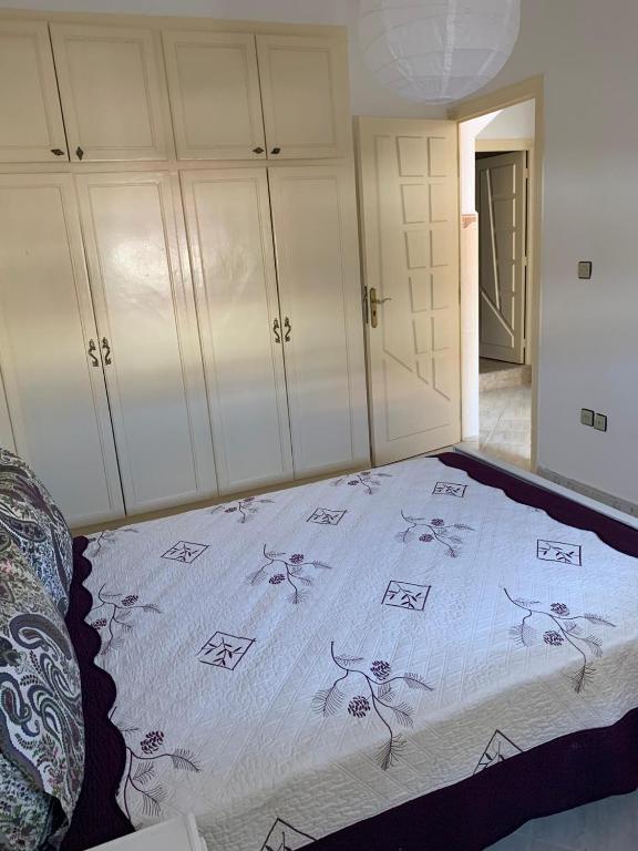 Postel nebo postele na pokoji v ubytování Ninasaidia
