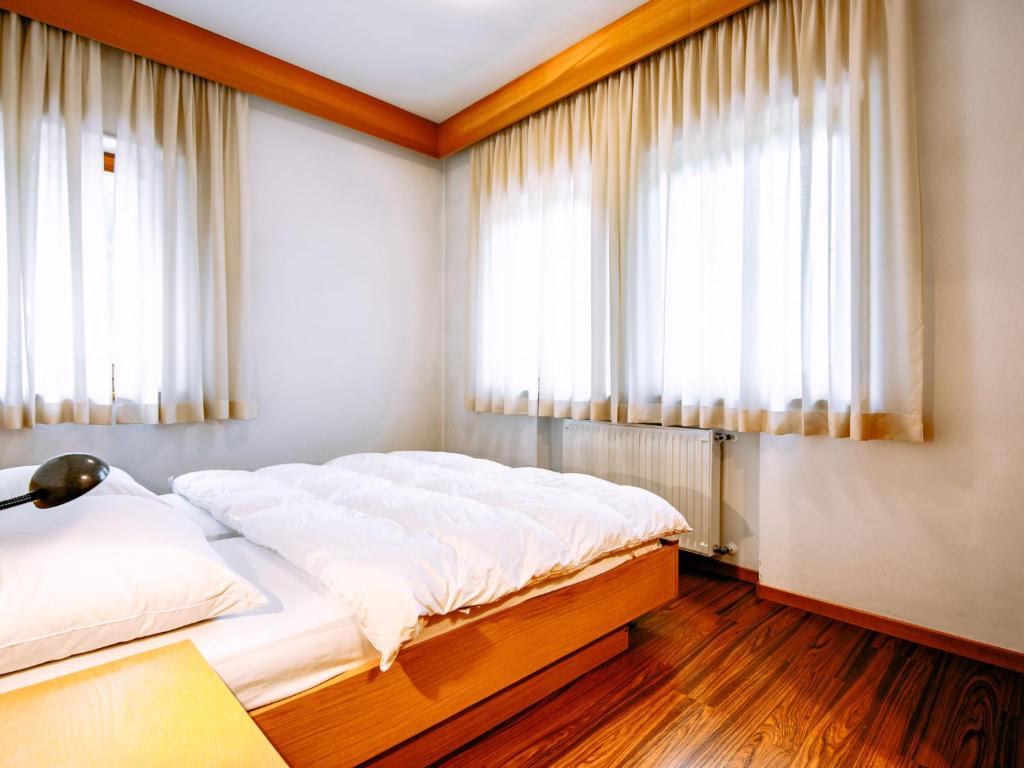 Postel nebo postele na pokoji v ubytování Apartment Ardoney by Interhome