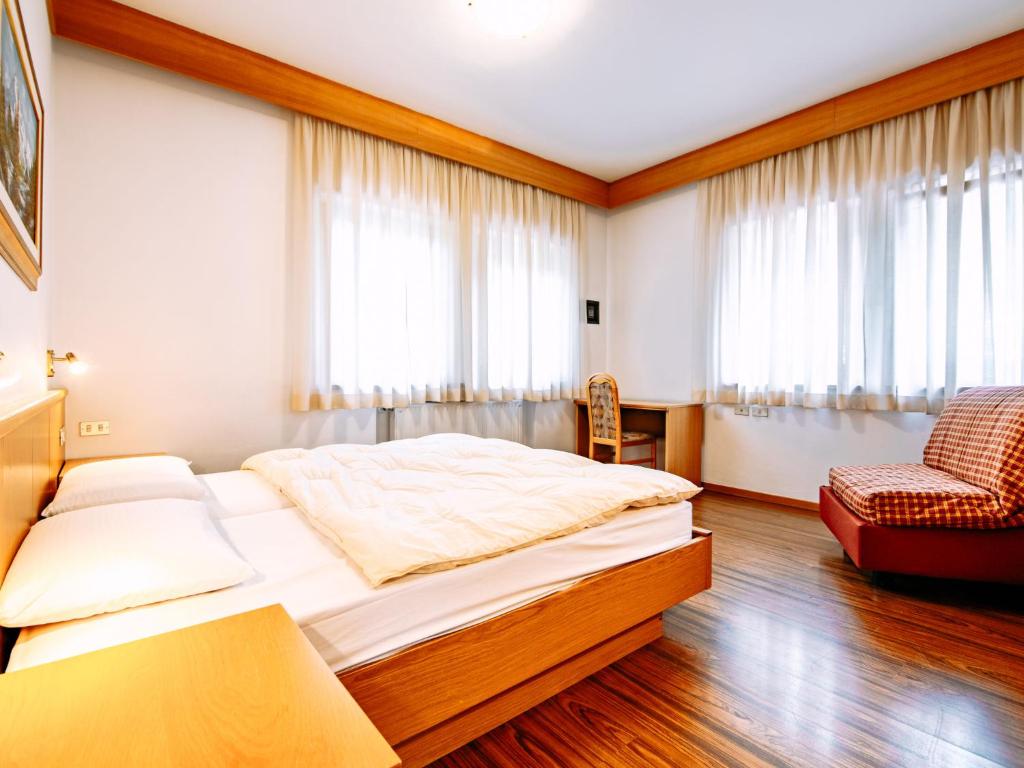 Postel nebo postele na pokoji v ubytování Apartment Ardoney by Interhome
