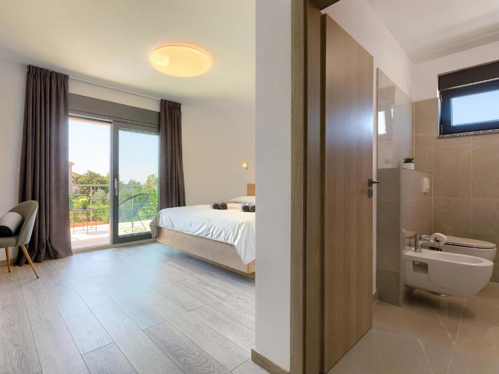 Kúpeľňa v ubytovaní Holiday Home Villa Essea by Interhome