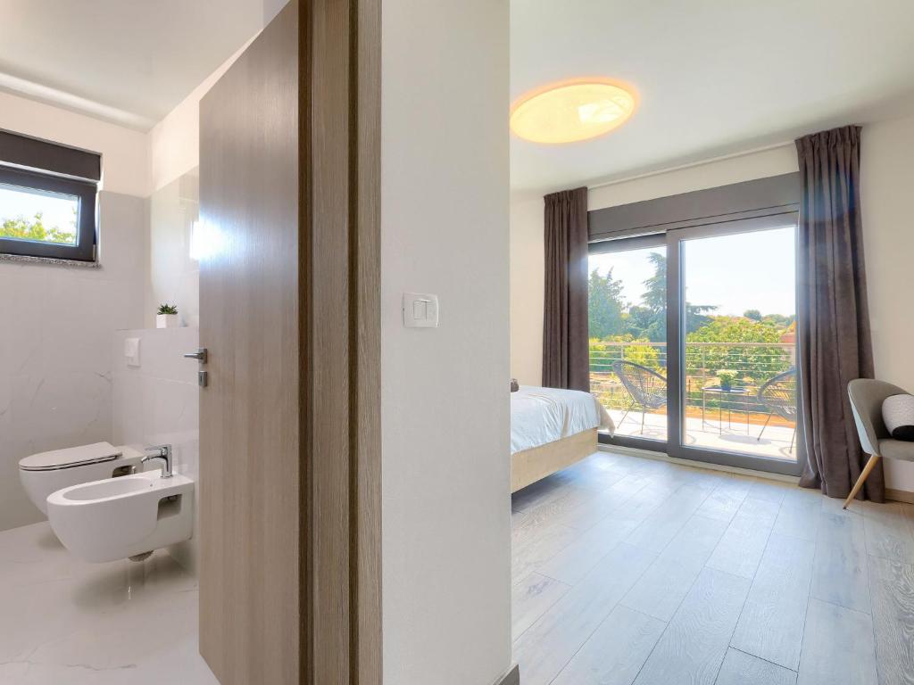 Kúpeľňa v ubytovaní Holiday Home Villa Essea by Interhome