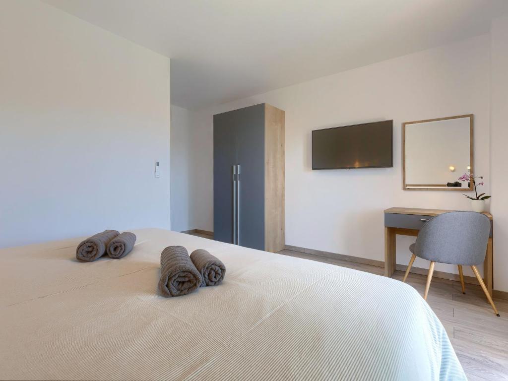 Posteľ alebo postele v izbe v ubytovaní Holiday Home Villa Essea by Interhome