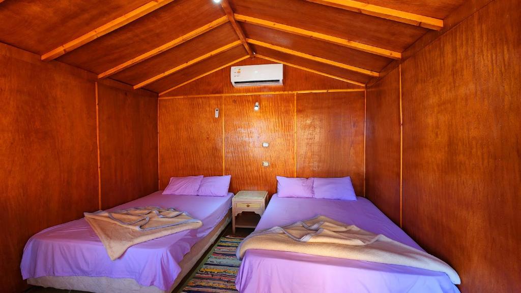 Postel nebo postele na pokoji v ubytování Cinderella Camp Nuweiba