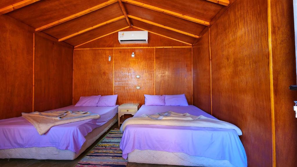 Postel nebo postele na pokoji v ubytování Cinderella Camp Nuweiba