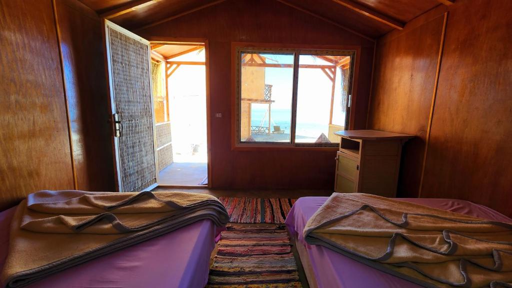 Postel nebo postele na pokoji v ubytování Cinderella Camp Nuweiba