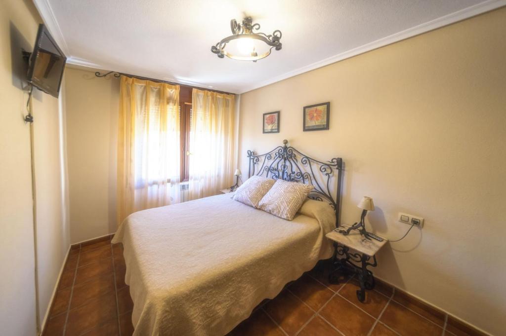 Postel nebo postele na pokoji v ubytování Apartamentos Trébede